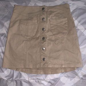 Beige button skirt from Charlotte Russe